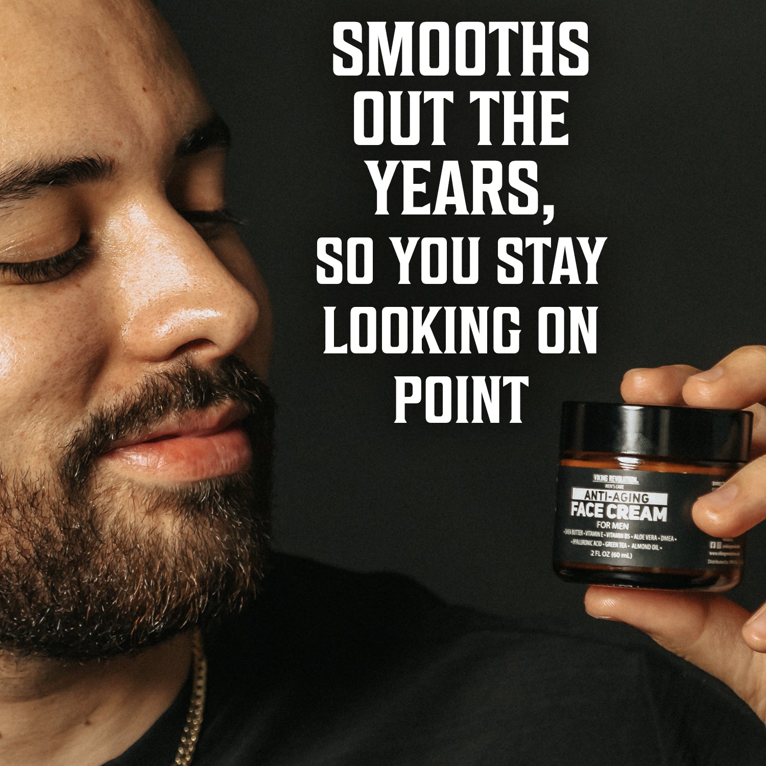 Man holding Anti-Aging Face Cream for Men - 2oz that helps smooth out the years.