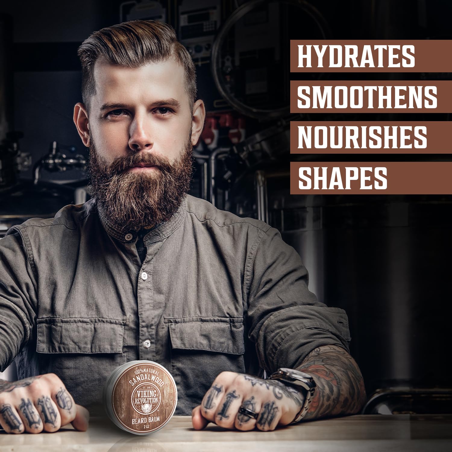A bearded man in a barbershop setting holds a jar of Beard Balm - Sandalwood Scent (2oz). Text: Hydrates, Smoothens, Nourishes, Shapes—ideal for combating beardruff.