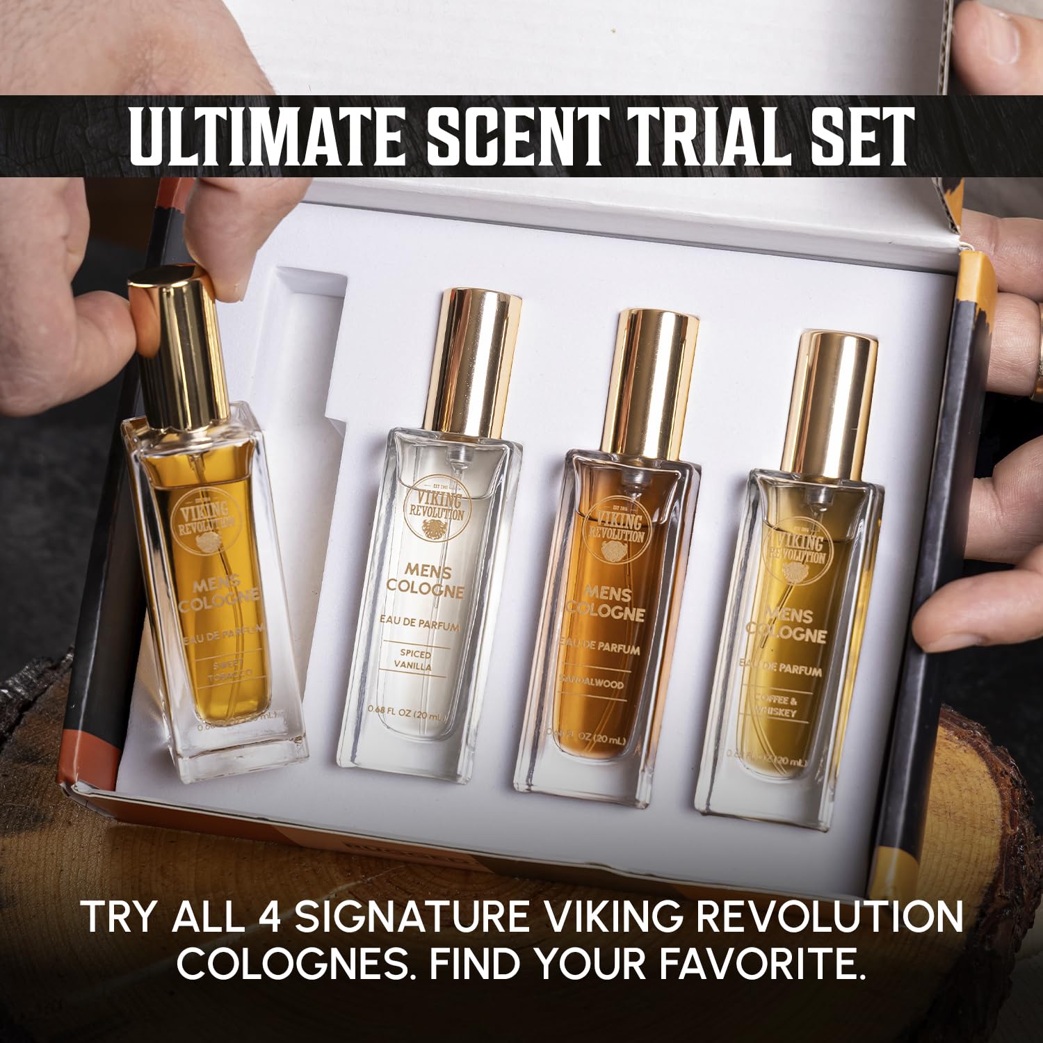 A hand holds a 4-pack travel size cologne set for men with Sandalwood, Vanilla, Coffee & Tobacco scents.