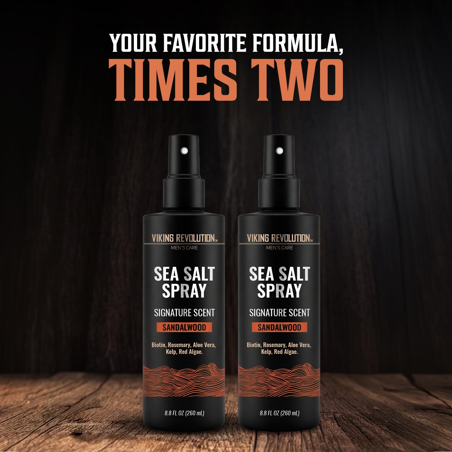 Two bottles of Viking Revolution Sea Salt Spray for Men, Sandalwood, 8.8oz each, on a wooden surface.