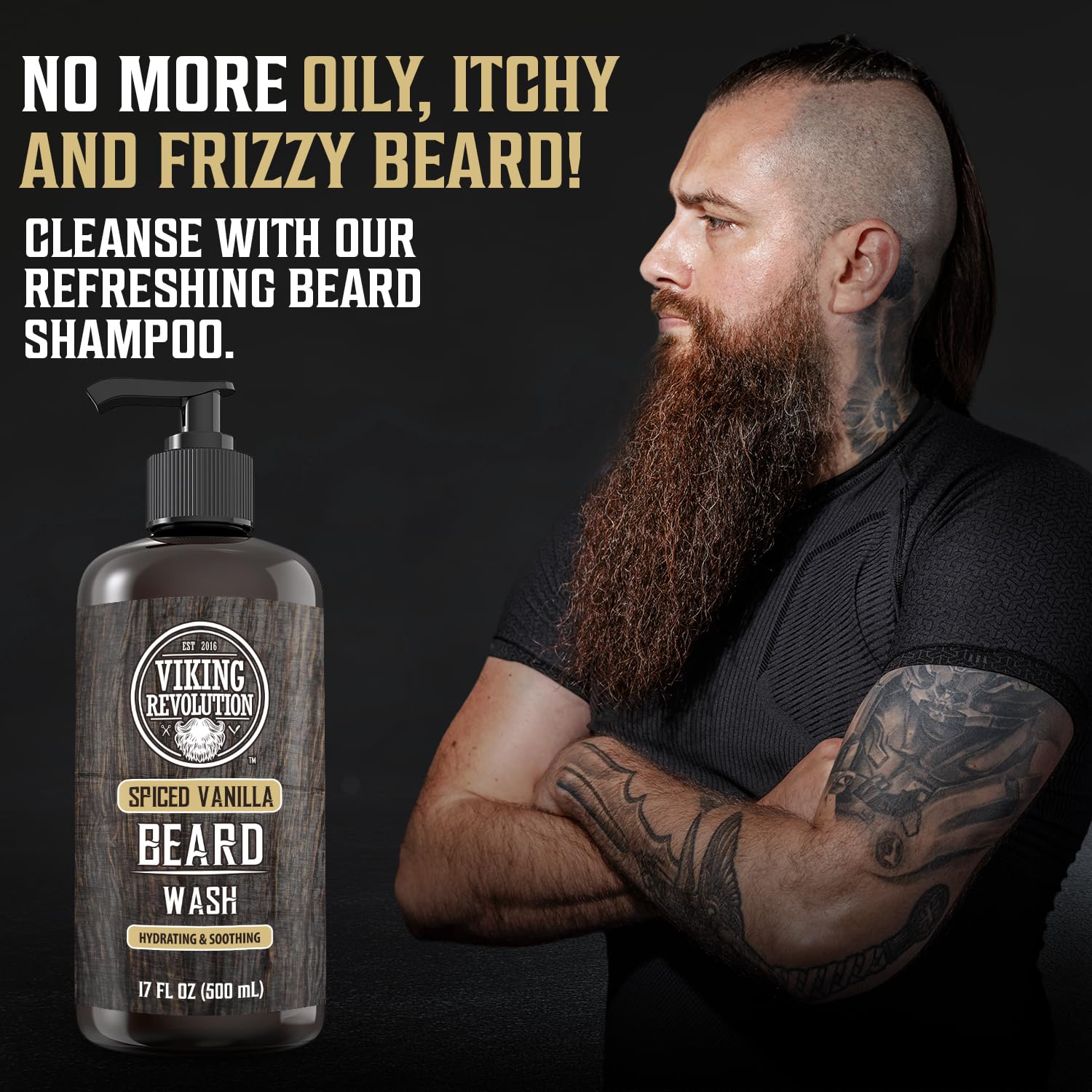 Man with a long beard and tattoos stands next to Beard Wash and Beard Conditioner 17oz Spiced Vanilla.