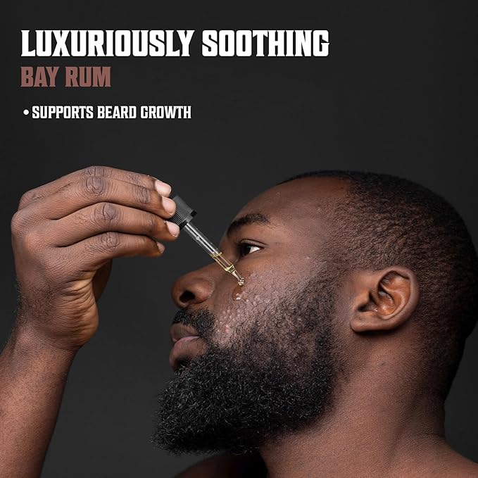 Man using dropper to apply Bay Rum Beard Oil - 3 Pack 1oz for luxurious beard care.