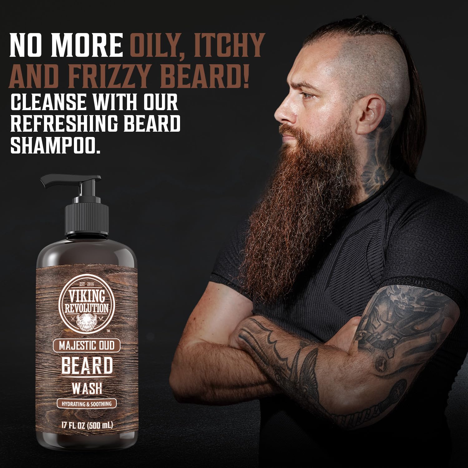 A bearded man with tattoos stands beside a bottle of Beard Wash and Beard Conditioner 17oz, Majestic Oud, showcasing the ultimate in beard care.