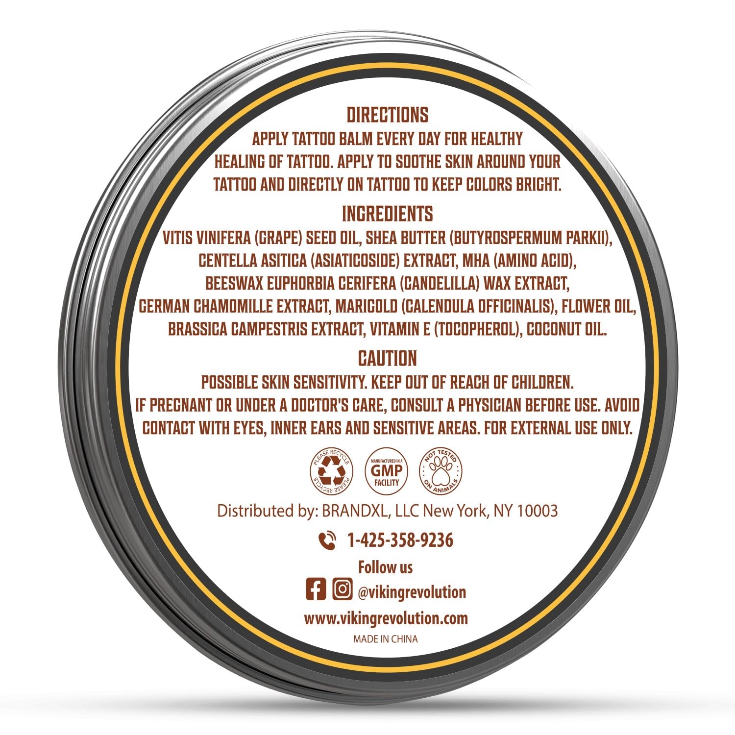 Tattoo Care Balm tin showing skin care directions, ingredient list, and contact information.
