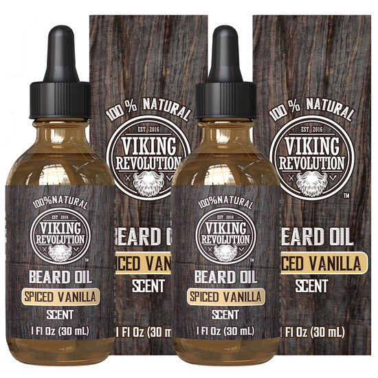 Three bottles of Spiced Vanilla Beard Oil by Viking Revolution for natural beard care with boxes.