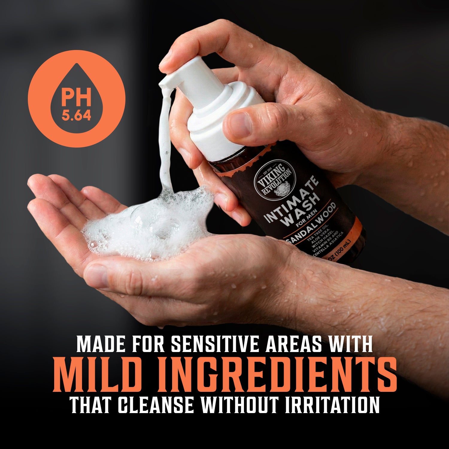 Hands dispense foam from Mens Intimate Wash with aloe, tea tree oil, and witch hazel (3.4 fl oz).