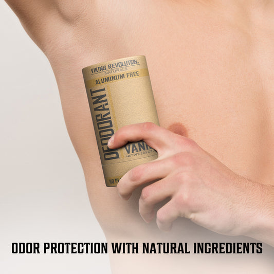 Applying Deodorant - Spiced Vanilla from a tan container to their underarm.