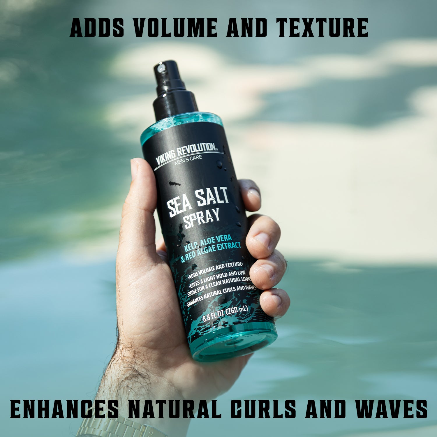 A hand holds Ultimate Hair Care Sea Salt Spray by a pool; text: Adds volume and hair texture powder.