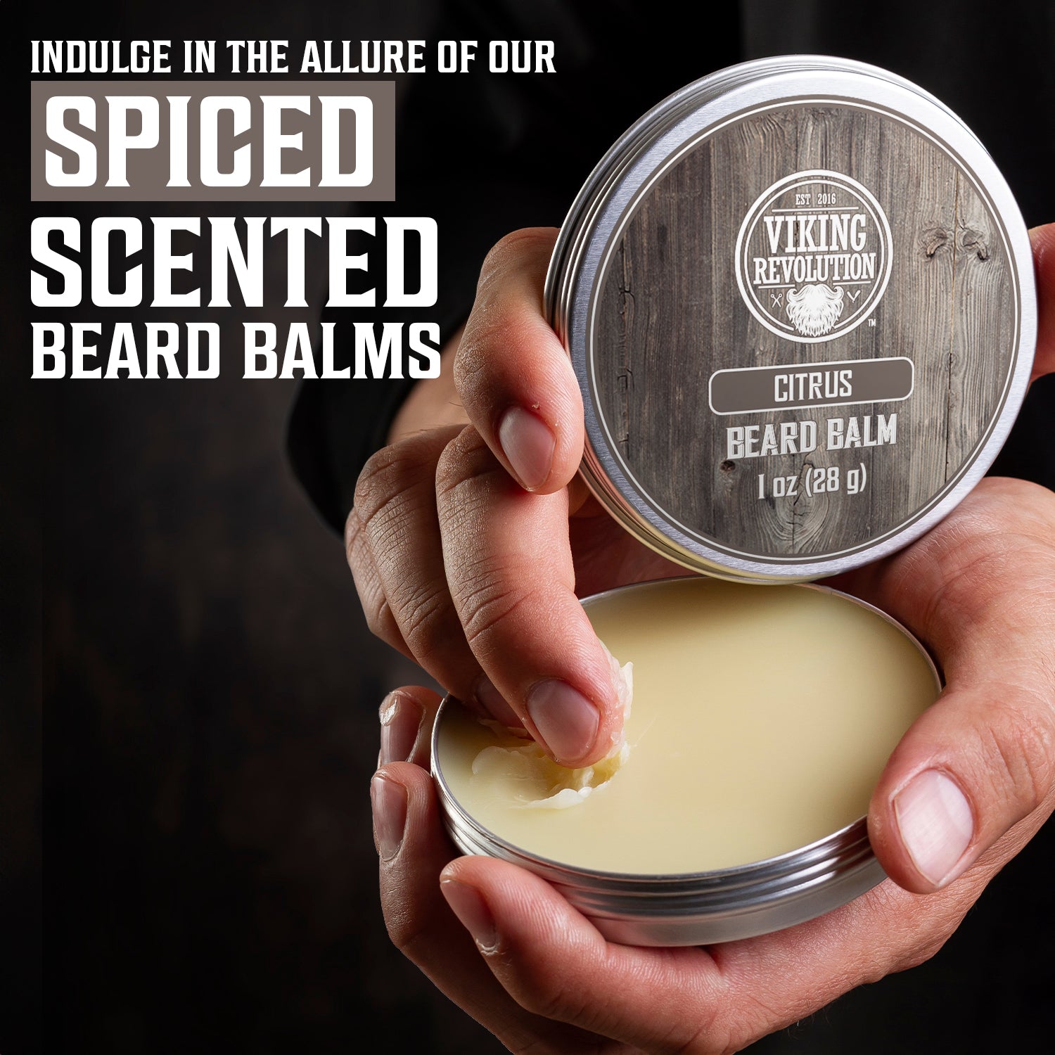 Hands holding the Citrus Beard Balm from the 4 Beard Balm Variety Pack for spiced-scented beards.