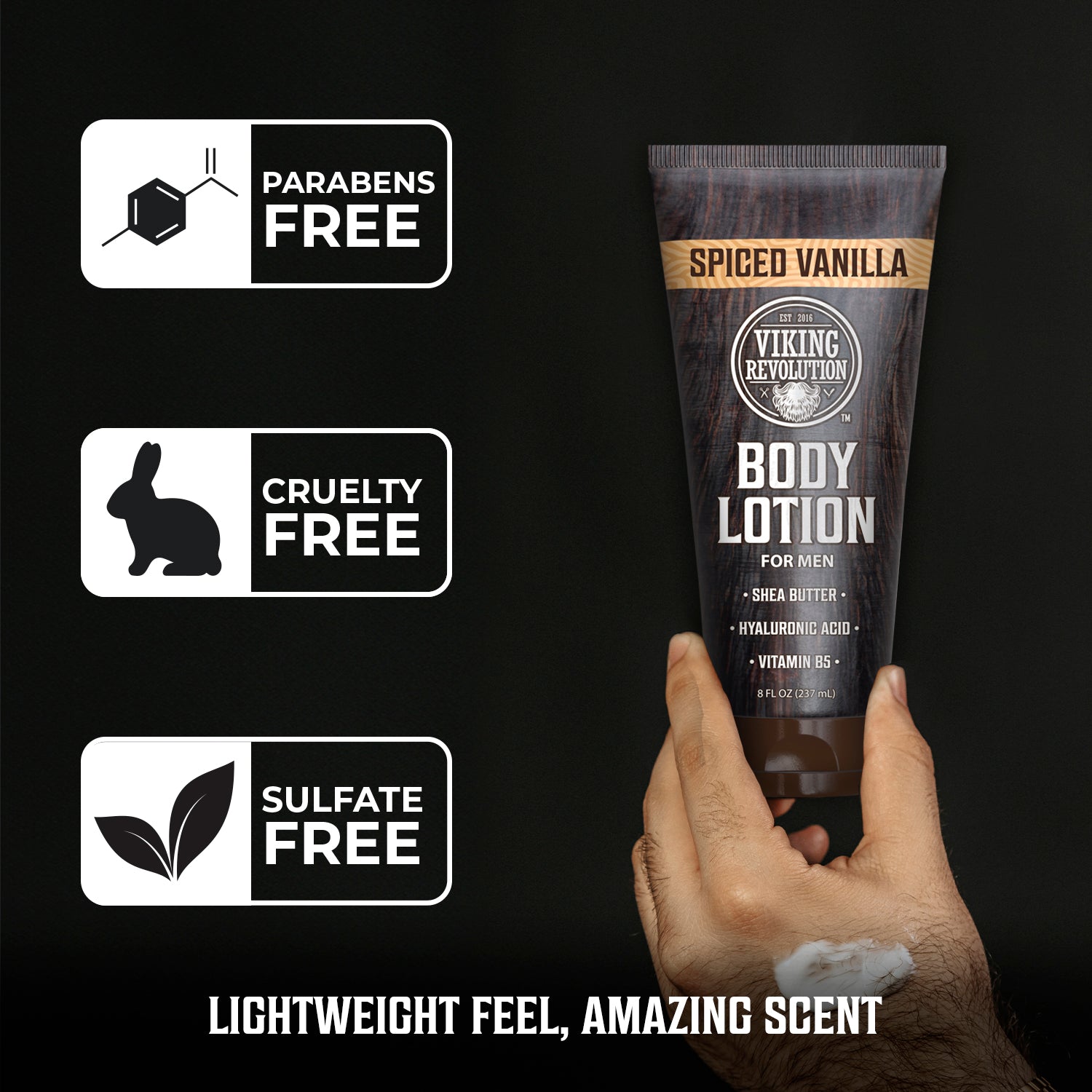 Hand holding tube of Body Lotion for Men - Spiced Vanilla; paraben, cruelty, and sulfate-free labels shown.