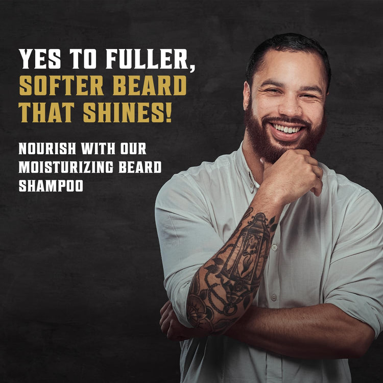 Tattooed man promotes Sweet Tobacco Beard Wash with Argan & Jojoba against a dark background.