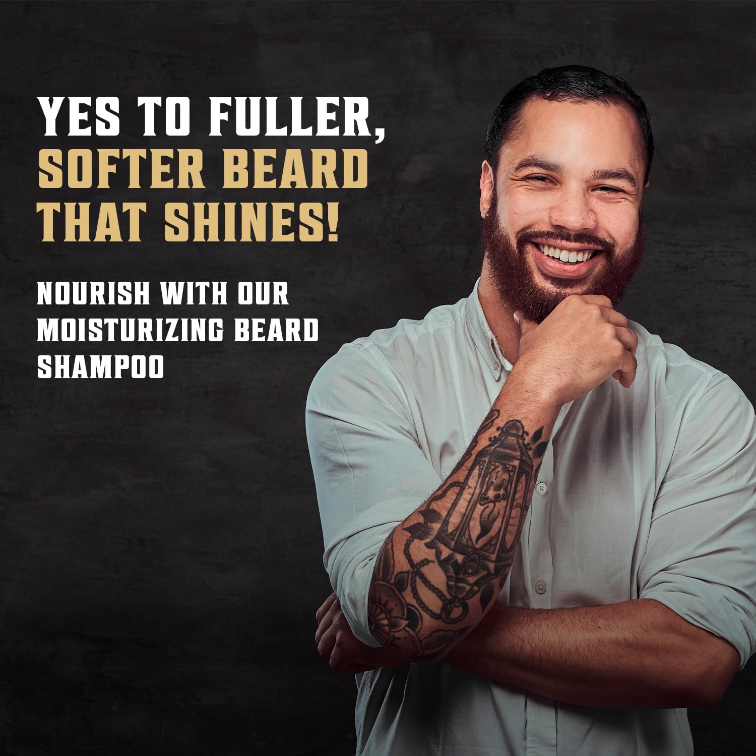 Tattoed man smiling, endorsing Beard Conditioner Spiced Vanilla with Argan and Jojoba Oil for a soft beard.