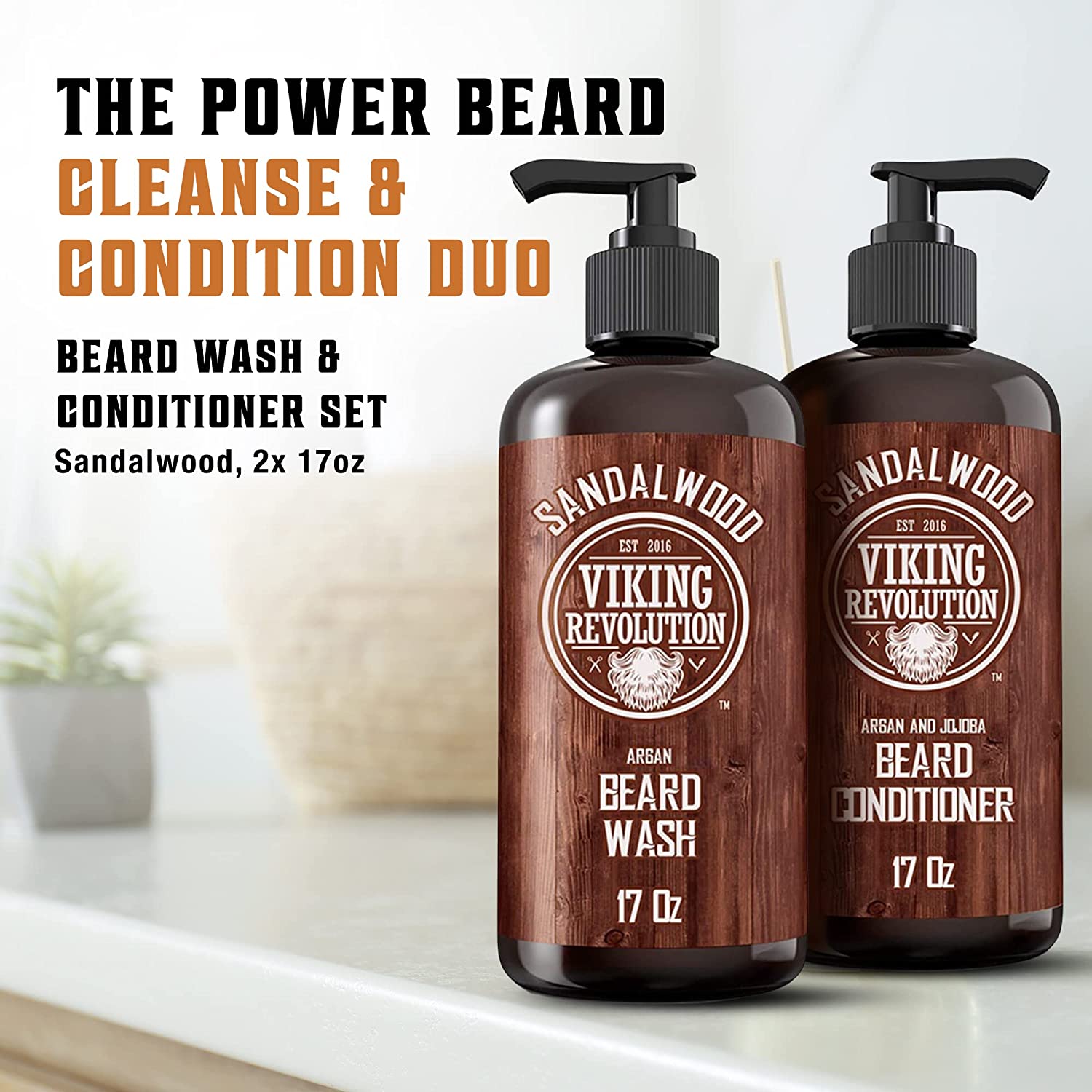 The Sandalwood Beard Wash & Conditioner Set - 17oz, made with all-natural ingredients and boasting a rich sandalwood scent, rests on the bathroom counter. This set is crafted to promote healthy beard growth while ensuring your facial hair remains clean and conditioned.
