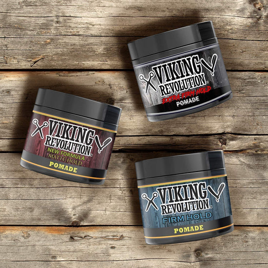 Three jars from the Hair Pomade Mix - 3 Pack are elegantly arranged on a wooden surface, ready to transform any hairstyle with the power of authentic Viking style.