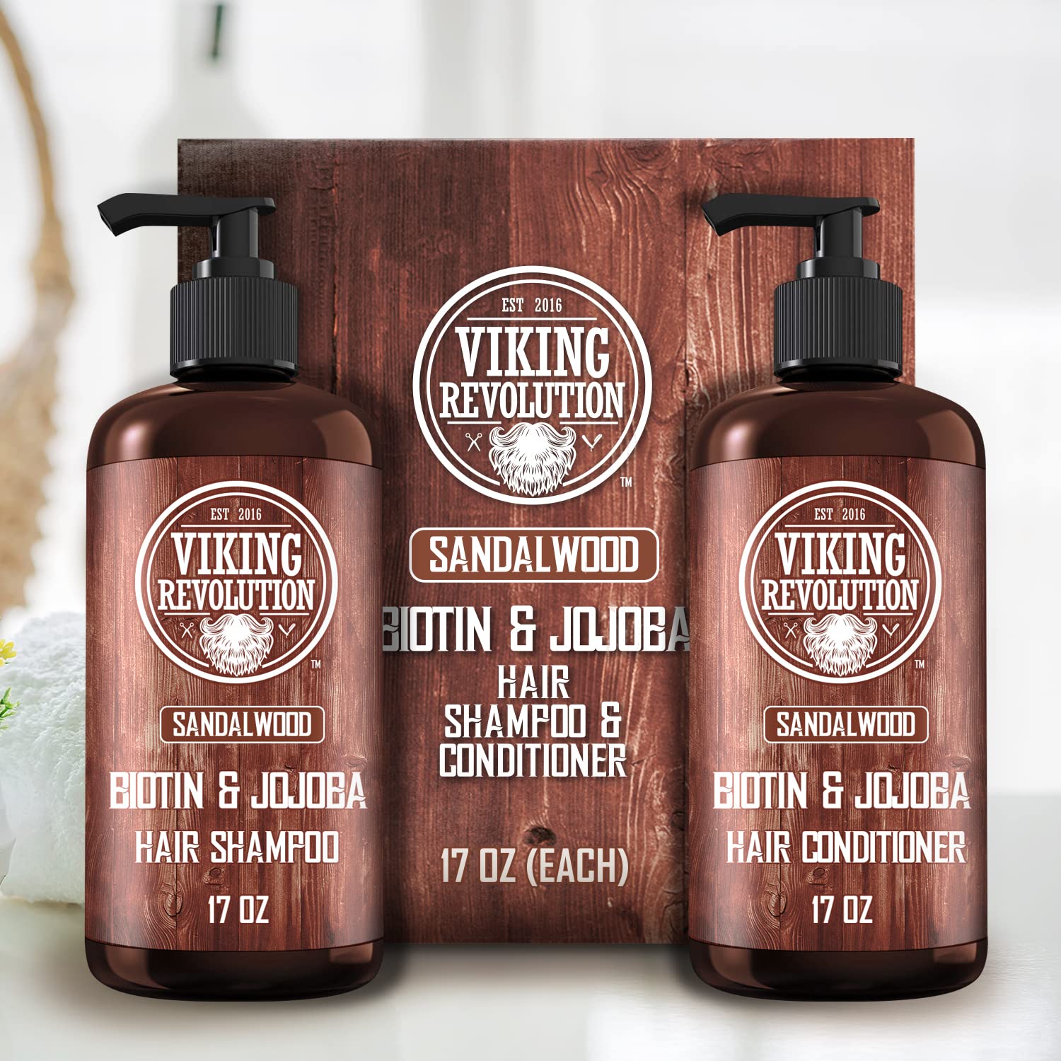 Experience the rejuvenating power of Viking Revolution's Sandalwood Shampoo and Conditioner Set, specifically designed for men with thinning hair. Enriched with biotin and jojoba, this set includes two 17 oz bottles to help achieve fuller, healthier hair.