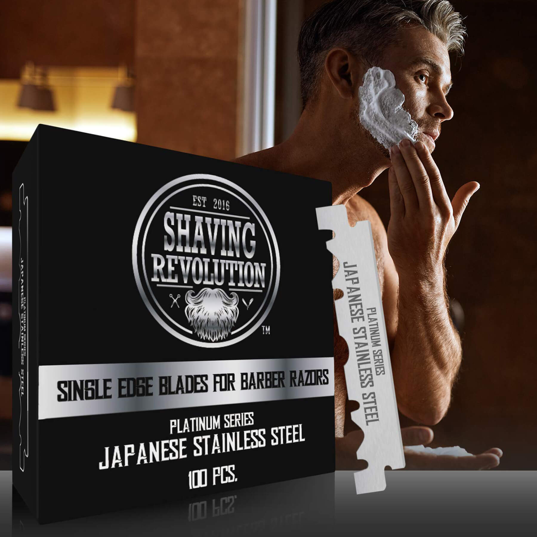 Man shaving with Barber Single Edge Razor Blades (100 count) package in foreground, featuring Precise Shave.