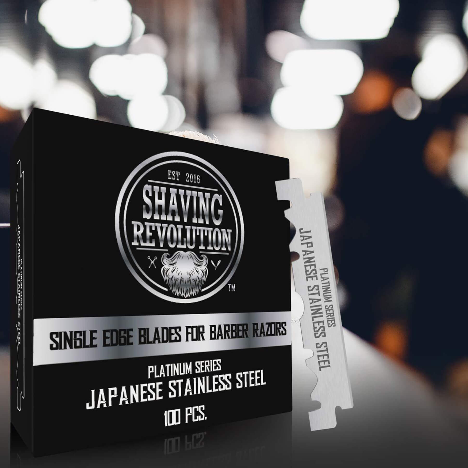 Close-up of a Barber Single Edge Razor Blades (100 count) box with Japanese stainless steel blade beside it.