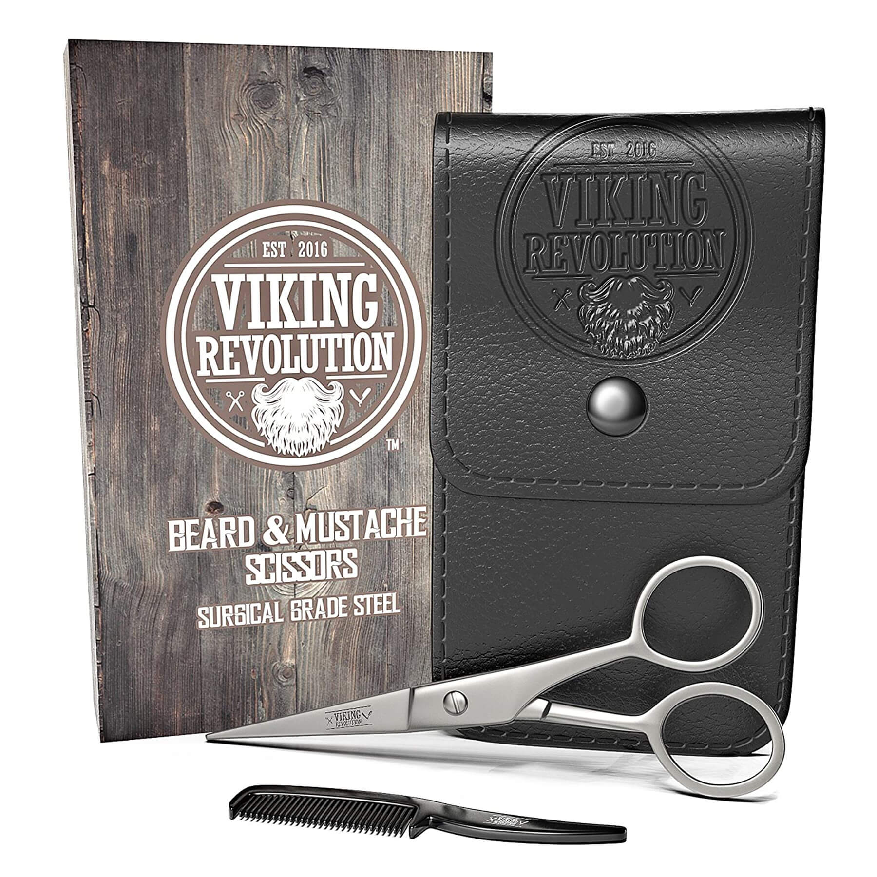 Scissors, mustache comb, and leather case near a Viking-themed box for beard trimming essentials.
